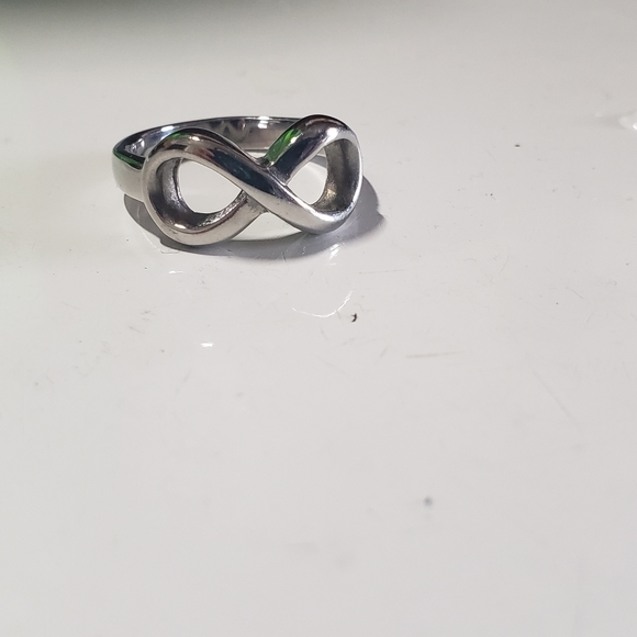 Size 7.5 infinity ring - Picture 5 of 6
